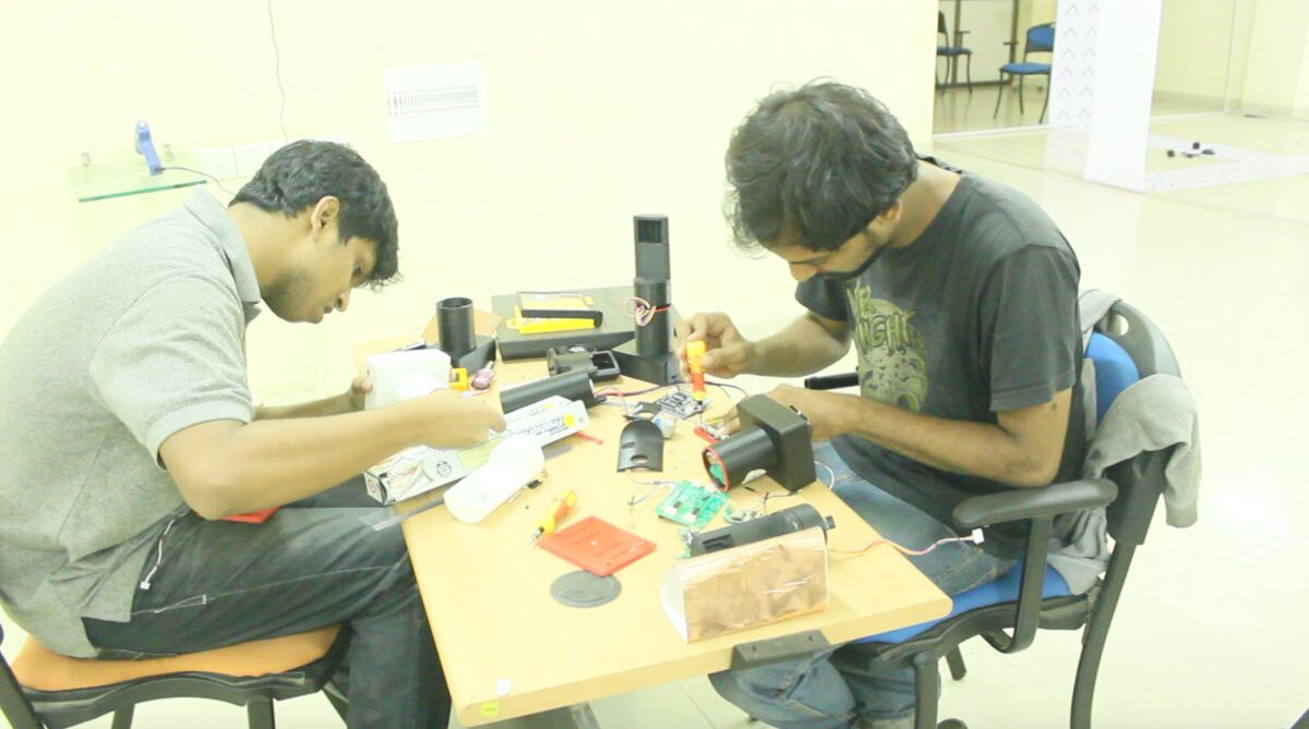 Saboor and Varun assembling the product for shipment.
